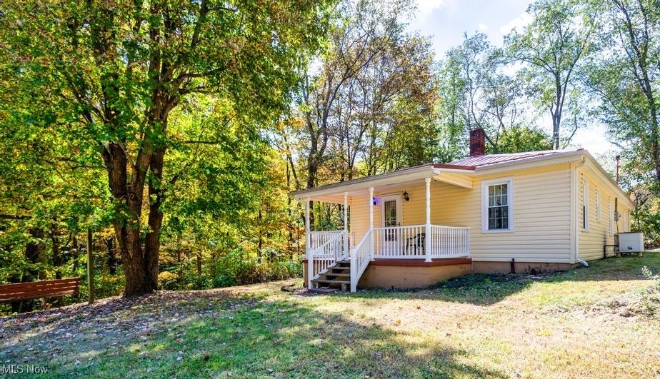 ALERT: ANY FIRST TIME HOME BUYERS!! Private country living for a mortgage that may be cheaper than rent off of SR (PLEASANT HILL AREA) 213. Tucked away with a hidden driveway, this home boasts a spacious 4-car tandem garage complete with a workshop featuring electric and heat, perfect for DIY projects or extra storage. The cute country eat-in kitchen is the heart of the home, while the charming beamed ceiling living room exudes warmth and character. With 3 bedrooms and a full bath on the main level, this home offers comfortable living spaces for your family. Additional storage space in the basement with a walkout provides even more room for your belongings. Plus, you'll love the low maintenance and durability of the metal roof, along with other updated amenities throughout. Newly surveyed of over one acre let's get you to switch your addresss to this adorable home! **SELLING AS IS WHERE IS-SELLER KINDLY ASKS FOR A 30 DAY POST CLOSING POSSESSION OF GARAGE ONLY. **SELLER CURRENTLY ASKS FOR ALL OFFERS TO BE SUBMITTED BY 6PM SUNDAY 9.21.25.