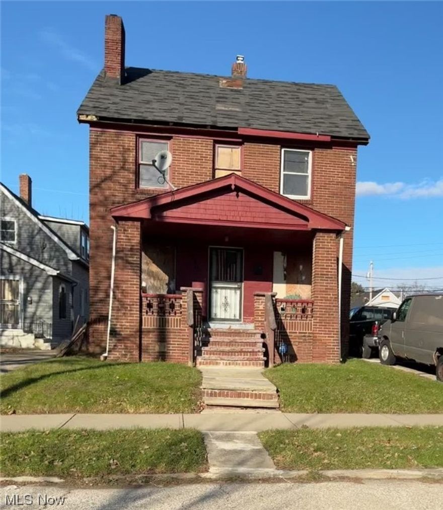 Charming three-bedroom Colonial with a full basement, nestled in a nice neighborhood, boasts timeless appeal with a welcoming front porch and original wood floors throughout. The living room features a cozy fireplace, creating a warm and inviting atmosphere. The property includes a spacious rear yard perfect for outdoor activities and a convenient two-car detached garage. The house is being sold AS IS, WHERE IS, and is currently occupied by squatters; the buyer is to assume responsibility for the eviction process. Ideal for investors or those seeking a unique opportunity to restore this home to its full potential. With legal guidance, transform this property into a dream residence while navigating the current occupancy situation.