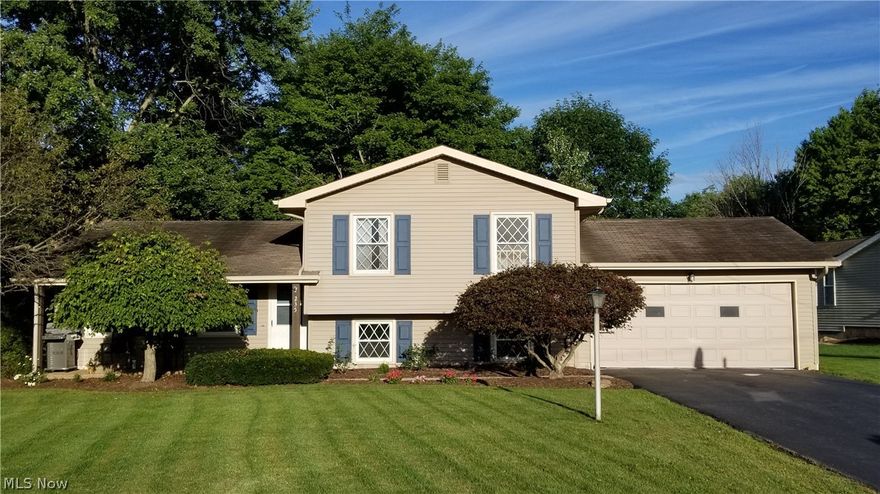 Recently updated and ready to move into! Family room with fireplace, lower level recreation room, newer furnace, central air, and siding. See it now before its gone! Private wooded lot!