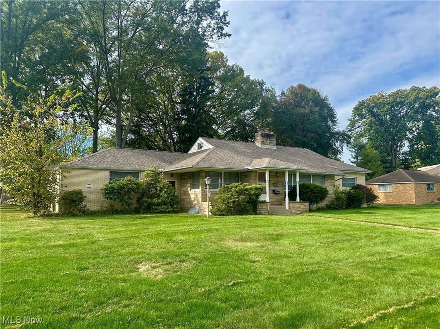 Discover the charm of this solid brick ranch home, perfectly positioned on a spacious corner lot in a classic Northeast neighborhood. This residence is situated near schools, shopping and the prestigious Trumbull Country Club, making it an ideal choice for those who value comfort, practicality and an active lifestyle. As you step inside, you are greeted by expansive living and dining areas adorned with beautiful hardwood floors and large windows that flood the space with natural light. The elegant marble fireplace serves as a focal point, creating a warm and welcoming atmosphere. The kitchen is designed for functionality, offering ample space for a dining table and plenty of room to prepare your favorite meals. The well-appointed bedrooms all feature large closets, including a coveted cedar-lined closet that provides the perfect environment for storing seasonal or delicate clothing. Speaking of storage, it will never be an issue in this house thanks to the finished walk-up attic with built-in drawers and hardwood floors, offering endless possibilities for organization and efficiency. The basement has a full bath, laundry area and plentiful space for all your belongings. Additional highlights include an enclosed breezeway connecting the garage to the house, an oversized driveway leading to a rear-entry garage and a lovely backyard perfect for outdoor activities or relaxation. As a bonus, the roof (2023) and A/C unit (2022) have been replaced. With its great location, sizable 0.48-acre parcel and quality construction, this home is a must-see for anyone seeking a blend of convenience, comfort and value. Plus, you're just a nine-iron away from the golf course! What more could you ask for?