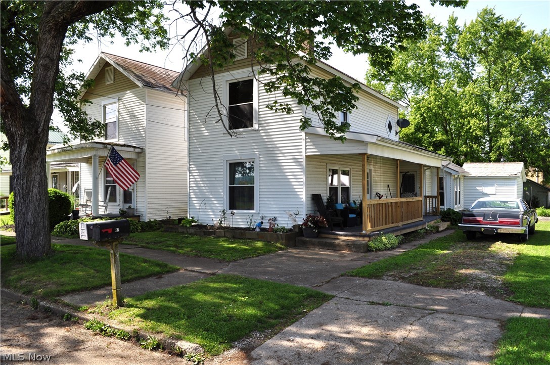 There is no better time to take advantage of the opportunity that a rental investment property has to offer. Nestled in the heart of Frazeysburg, this duplex has 3,024 sq. ft. of living space. The property consists of two single family homes that have been connected on the main floor and upper floor. Consistently occupied with little to no vacancies. The utilities are separated on each unit and are paid by the tenants.
Unit 82 has 1,684 sq. ft. of living space consisting of 3 bedrooms (2 upstairs, 1 down), 1 bathroom (downstairs), living room, dining room, kitchen, laundry room, small storage room, and a garage. Heated with a gas furnace (installed 2017) and cooled with a central air unit (installed 2017). The main part of the house has a slate roof and the rest of the house has a shingle roof (installed 2016). The large backyard offers a nice retreat for grilling and a fire pit. The basement, accessible from inside, is underneath the dining room and a crawl space is under the remaining portion of the house. In 2023, the side porch was reconstructed, new entrance doors, interior doors and vinyl windows were installed.
Unit 84 has 1340 sq. ft. of living space consisting of 2 bedrooms (2 upstairs), 1 bathroom (upstairs), living room, dining room, and kitchen & laundry room. A gas furnace, gas water heater (installed 2017), and sump pump are located in the basement, accessible through an outside entrance. The basement is below the kitchen and a crawl space is underneath the remainder of the house. The central air unit is located to the side of the house. A slate roof covers the house and a tin roof covers the back porch. In 2023, the back and front porches were reconstructed, new entrance doors, interior doors and vinyl windows were installed.
The property is close to Columbus , Intel, Newark, Zanesville, Cambridge, and Coshocton. Nature areas are nearby at Blackhand Gorge, Dillon State Park, Woodbury Wildlife Area, and Panhandle Bike Trail.