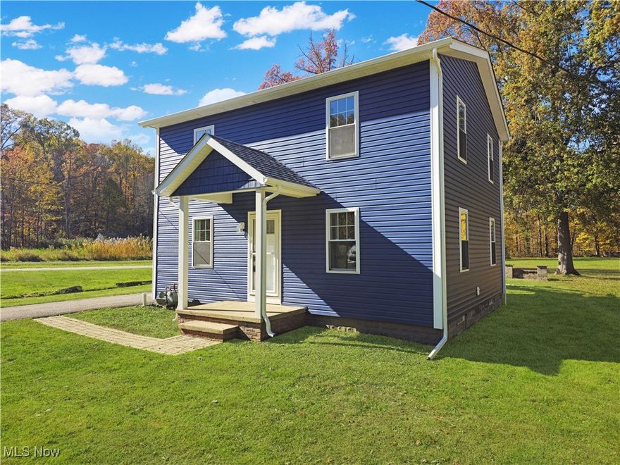 Fully renovated with a seamless new addition completed in 2025, this 4-bed, 2-bath Willoughby Hills retreat sits on 1.37 acres of open greenspace and woods with a private trail. Inside, sunlight and fresh finishes welcome you: a brand-new kitchen includes stainless steel fridge, stove and microwave appliances. Finishing kitchen off with new shaker cabinets and granite counters. Two beautifully updated full baths on each floor with top end tile and led lighting. Large laundry room with brand new washer and dryer included that flexes as a guest bedroom or home office. Dinning room off kitchen floods with natural light with its wall of windows and high vaulted ceilings. Upstairs enjoy a lofty living room that leads to the second-story deck overlooking your deep yard. Out back, unwind or host on two concrete patios—both with power—one anchored by a cozy firepit. With a yard like this the possibilities are endless.

Comprehensive upgrades deliver comfort and confidence: (Everything New and Installed In 2025) New roof, gutters, siding, windows, doors and insulation. Complete electrical re-wire with new main panel, outlets and light and led lights throughout the home and hard-wired, interconnected smoke/CO alarms in every bedroom and on every floor. Foundation waterproofing, plus a Watchdog Wi-Fi monitoring-capable battery backup with primary and secondary sump pumps. New high-efficiency furnace, central air and a hybrid ProTerra Wi-Fi water heater with leak detection and auto-shutoff. New plush carpet upstairs and luxury wide plank waterproof flooring downstairs. No-detail-spared in these premium updates, makes this home feel like a new construction with all the upgrades.

Tucked away for peace and quiet yet close to everything: minutes to Historic Downtown Willoughby, Metroparks hiking, and local restaurants, with easy highway access for a short drive to Downtown Cleveland. Move-in ready—schedule your private tour today.