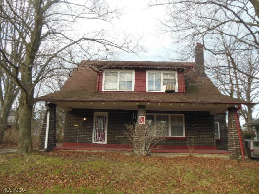 Many new improvements already done in this home.  All brick beauty & 4 lots total! Tree lined back yard with flower beds, plenty of room! 2 doors  from famous Fifth Ave. Big bold rooms with so much style! Original Mosaic tile in luxiourus Foyer, Arched Original pew seating for your guests Hardwood floors, substantial Crown molding & chandeliers adorn the rooms. Boxed ceilings in formal dining room & huge den adjoining it window seats. Charming kitchen, ceramic tile floors & the quaintest church pew breakfast room. high ceilings & arches here. Original cabinetry, built in extras! FIRST FLOOR Super private Master wing  traditional tiled original bath, & bedroom has its own fireplace, arched plaster detailing & super sized closet. Upstairs has another Master bedroom with a fireplace, plush carpeting, big closet with surprise extra door to full insulated attic, with floor and lights, 2 windows. and stairs. Master has door to the full bath. All the bedrooms are carpeted, & all but one have