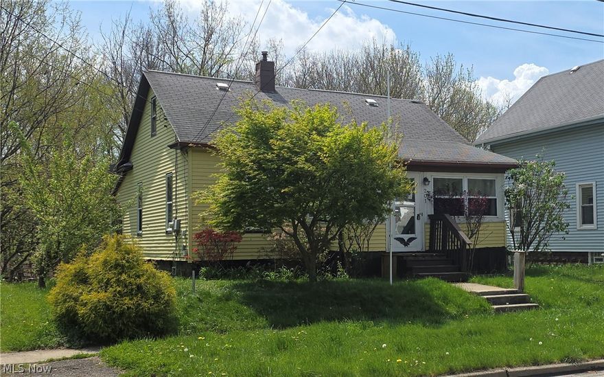Attention investors and handy buyers! Opportunity awaits with this 2-bedroom, 1-bath bungalow featuring a 1-car garage and scenic backyard views. Built in 1910, this home is in need of renovation and is being sold as-is. A new furnace has already been installed, providing a solid start for your project. The backyard offers a peaceful setting with a small ravine, creek, and wooded backdrop. An enclosed front porch adds additional usable space. All building materials currently in the home will remain. Seller purchased for $83,000 in December 2025 but no longer has the time to complete the intended renovation. Now offered at $72,000...priced for a quick sale. Great Airbnb potential with being close to the New Celestial Theatre. Bring your vision and your offers!