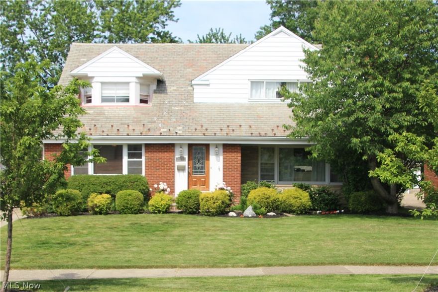 This spacious 3 bedroom is a Must See*Large living and dining room with cove ceilings* First floor has a great circular flow for family living and entertaining*Updated kitchen has granite counters, SS appliances and ceramic flooring* First floor den with a wall of built-in shelves* Master bedroom with en-suite and two walk-in closets * All 3 full baths have been updated (2 have tiled showers) *Need a first floor bedroom? Consider converting the den into a bedroom and a full bath with multi head shower is conveniently located nearby * Finished rec room with ceramic tile floor, glass block windows and half bath*First floor laundry area* Charming Dutch door in the kitchen leads to the 3 season porch with access to the rear paver patio and yard * Conveniently located