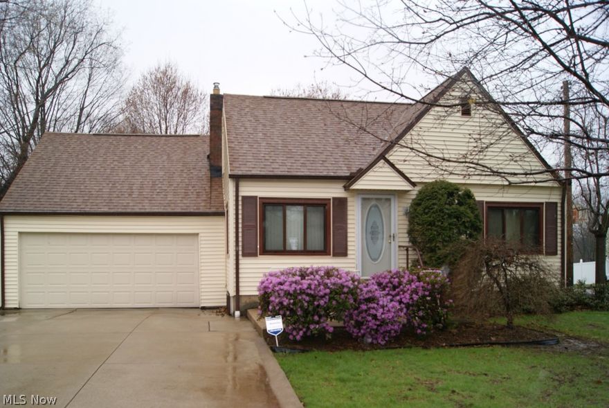 Welcome home to 272 Dunn St. in Barberton!  3 bedroom cape on a nice size city lot.  2 car attached garage with opener and cold water.  Large living room and formal dining room.  Home remodeled on 1st floor and bedroom #2 down to the studs (5 years).  Updated kitchen with Oak cabinets, corian counters, and pantry with pull-outs.  Master bedroom with new carpet (2014) 100 amp service.  Roof (2010) with tear-off and 30 year shingles.  Family room in basement has egress window.  Glass block windows in rest of basement.  HTW (2013).  High-efficiency furnace and AC (2004).