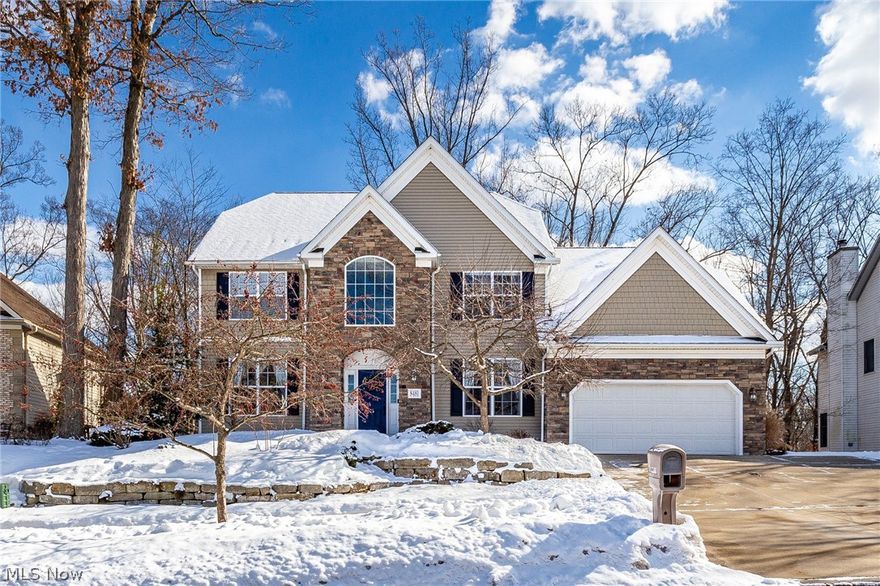 You will fall in love with this beautiful one owner home the moment you pull in the driveway! This home features a beautiful stone, vinyl cedar shake, and vinyl siding front elevation! With spring and summer right around the corner you will see the beautiful landscape stone that compliments the stamped concrete walkway leading to the front door. Walking through the front door you are greeted by new laminate wood floors that flow throughout the first floor that has 9' ceilings! The stunning open concept kitchen has been recently updated and features beautiful Kraft Maid white shaker cabinets, a massive island, farmhouse sink, gorgeous granite countertops, black stainless steel appliances, a huge walk in pantry and new lighting! The downstairs also has updated door hardware, has been freshly painted, beautiful dining room, and living room! Off the kitchen you will find sliding glass doors that lead to your private 40x12 Trex deck that has an awesome sunken hot tub that can be enjoyed yea