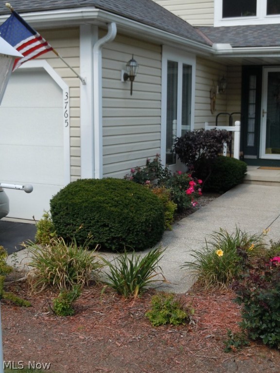 Act quickly on this desirable condo! Great location and many stand-alone features, like the walk out basement AND main level balcony...all facing a serene wooded area. New stove, microwave, and dishwasher stay. New windows, sliding doors and roof as well. There are too many wonderful things about this condo to list (spacious rooms, wood burning fireplace, one car garage, just to name a few). Make you appointment today, this one won't last long! No pets, move-in date is the first weekend of October.