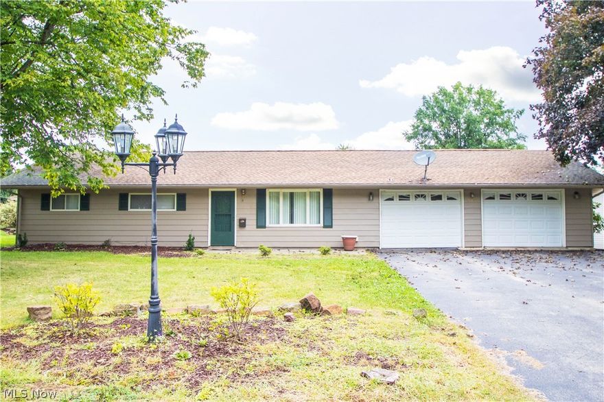 Spacious 3 bedroom ranch in Austintown schools. Updated kitchen with appliances. 1st floor laundry. 3 bedrooms and 1 full bath. Exterior living space includes a covered back porch and fenced in yard. Shed and attached 2.5 car heated garage. All of this sits on 3 lots. Updates include new roof, furnace and hot water tank, garage floor and walls painted, new kitchen floor, and new carpeting on back porch. Call today for your private showing!