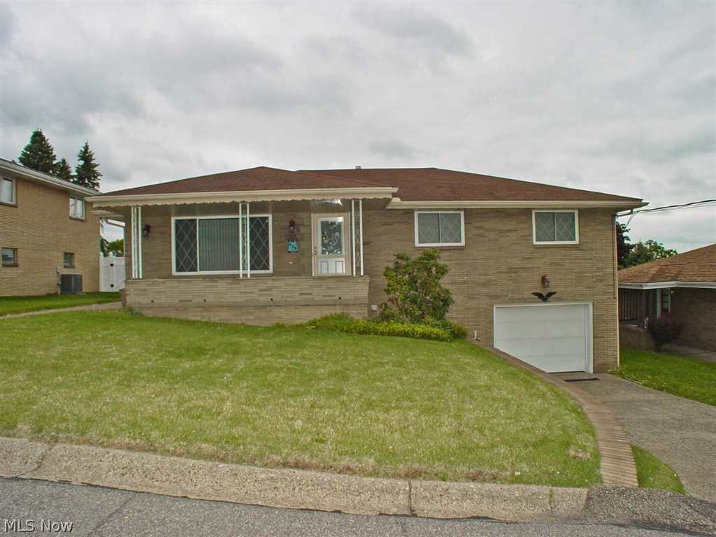 Immaculate 3BR, 2BA brick ranch on Weirton Heights. Large finished Rec room, eat-in kitchen, updated roof, windows & furnace. Tons of storage, level yard & 1 car garage. This little gem will sell fast!