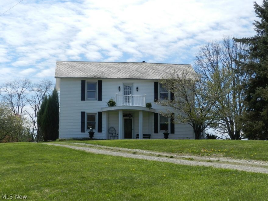 This peaceful 22.6 acre farm nestled in the beautiful hills of Morgan County offers a great taste of country living! With a gorgeous 2 story farmhouse with 4 bedrooms and 1 ½ bath and a shop, this place has lots of unique features. A balcony out of the master bedroom, screened in porch, and a large patio all add to the uniqueness of this house. This acreage offers nature at its finest with lots of evergreens and abundant wildlife. The O/G rights are unleased and will transfer. The property will be offered in 3 parcels and as a combination
Parcel 1: 3.75 acres +/- surface rights only with 433 Ft road frontage. Includes house, mobile home and all the outbuildings.
Parcel 2: 18.89 acres +/- surface rights only with 580 ft. road frontage. Great hunting and potential timber.
Parcel 3: 22.6 acres +/-  unleased oil and gas rights.