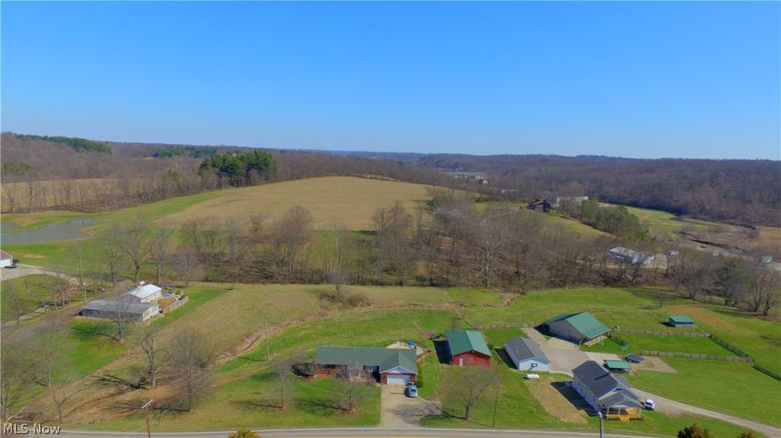 Solid & Sturdy!  Brick Ranch home sitting on 2.88 acres where livestock is permitted!  Loads of space!  3-car attached garages and 3-car Oversized pole building with stable area.Easy access to RT 40, Interstate 70, & North-End shopping, restaurants, hospital, & doctor offices.  Detached 3+ car garage has stable on left side that opens up into the fenced field.  28-foot round pool with surrounding deck.  All appliances stay, including Washer & Dryer!  Walk-Out Basement w/4 large storage rooms, laundry shoot, Freezer & 2nd Refrigerator!  New roof in 2009.  New hot 80-gallon hot water tank!  Septic Inspection and Pump already completed by Chris Zemba 2/17.  Termite Inspection and 1-year warranty completed by Buckeye Nation Pest Control 2/17.  BDry in basement completed 3/17 with transferable buyer warranty!  Call for your private showing today!!!