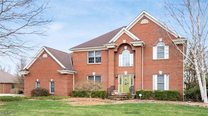 Step into luxury with this beautiful, two-story brick home located in the Maple Creek subdivision in Zanesville, Ohio. This home offers over 4,700 sq ft of finished living space including the fully finished lower level. Inside you will discover soaring ceilings, an open -concept layout, and an abundance of natural light.The main level features a grand foyer with a magnificent open staircase to the upper level. There is a room off of the foyer that would make a great office, music room or a cozy reading area. The dining room is open to the foyer and is very spacious. Between the dining room and kitchen you have a back staircase to the upper level. The gourmet kitchen has recently been updated with premium appliances, quartz countertops, and a spacious island. The kitchen features a cozy nook for in formal eating. The kitchen flows right into the family room that features a gas fireplace. You can access the large deck that overlooks the rear of the home from the family room. From the deck you can enter the other end of the home through a glass sun room into a  possible 5th bedroom that has a full bathroom. Upstairs you will find a split floor plan of bedrooms for additional privacy. The primary en suite is very spacious, with large windows, a gas fireplace and a walk in closet. The bathroom has been recently updated with a dual vanity,heated floors, lighting, a stand alone tub and a custom shower.The laundry  room is conveniently located on this level. You have a second bedroom suite with a private bathroom. There are two spacious bedrooms that share a full bathroom.  The finished walk out basement features a second family room with a gas fireplace, a full kitchen, a full bathroom with a walk in shower, a finished room with windows and a large storage area. Walk from the basement to a patio with a fire pit and a covered structure that would be perfect for entertaining.The back yard would offer plenty of room for outside activities or pool.This home has a 3 car garage.