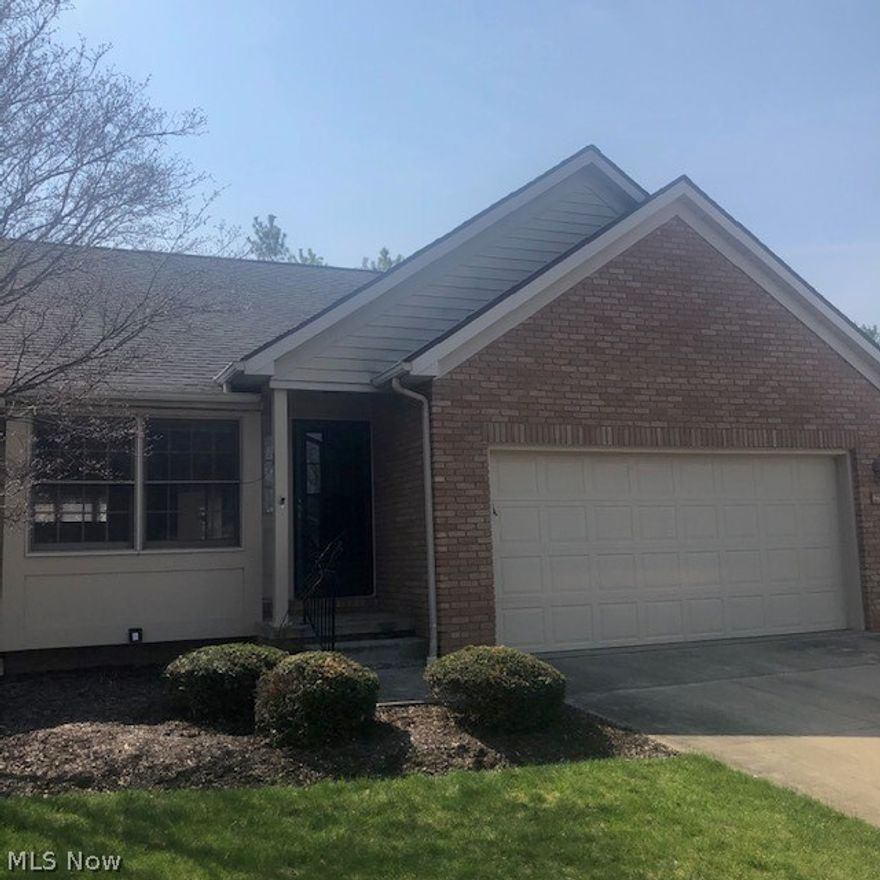 Gorgeous 2 bedroom/2 full bath cluster home on corner lot.  This home has neutral decor and Move-In ready!  The first floor entry has gorgeous parque flooring, leading to modern kitchen with loads of storage, pristine and fabulous eating area with a pass thru to the beautiful dining room.  The open floor plan extends the dining room to a fireplaced living room with vaulted ceilings and beautiful natural light leading to a perfect sunroom with slider to the patio overlooking a beautiful wooded creek.  THe first floor also includes an oversized master bedroom with walk in closet, master bath with garden tub and laundry area.  The second floor includes a loft overlooking the fireplaced living area perfect for an office or for relaxing and a second large bedroom with full bath.  The full basement is perfect for storage and extra space to grow.  All of this and an attached garage! This home is priced to sell and ready for a new owner.