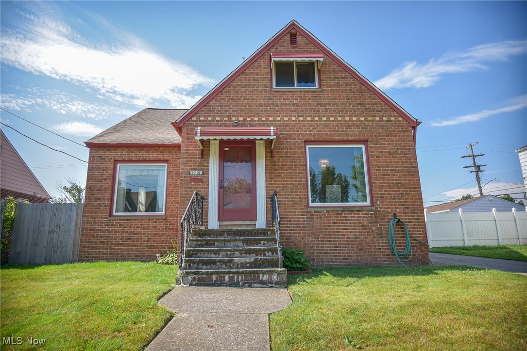 This well-maintained four-bedroom, brick Cape Cod offers a spacious layout, natural light throughout, a finished basement, a great backyard space, and a detached garage. Step through the front door into a welcoming entryway with a convenient coat closet. Just beyond, the bright and airy living room features a large picture window that fills the space with sunlight. To the right, the dining room includes another picture window and a built-in corner cabinet, and flows into the generously sized eat-in kitchen—complete with oak cabinetry, granite countertops, more great natural light, and a breakfast bar perfect for a couple of stools. The main level also features two bedrooms with hardwood floors and a updated full bathroom with nature stone flooring located between them. Upstairs, you’ll find two more bedrooms and easy-access attic storage. The lower level features a finished rec room with nature stone flooring, a utility room with ample storage, and a separate laundry area. Step outside to enjoy a paver patio in the private backyard, ideal for grilling and gathering. Located near shops, restaurants, and highways, this home combines charm, functionality, and convenience in one appealing package. Recent updates include a hot water tank (2025), roof (2019), newer replacement windows, and carpeting.
