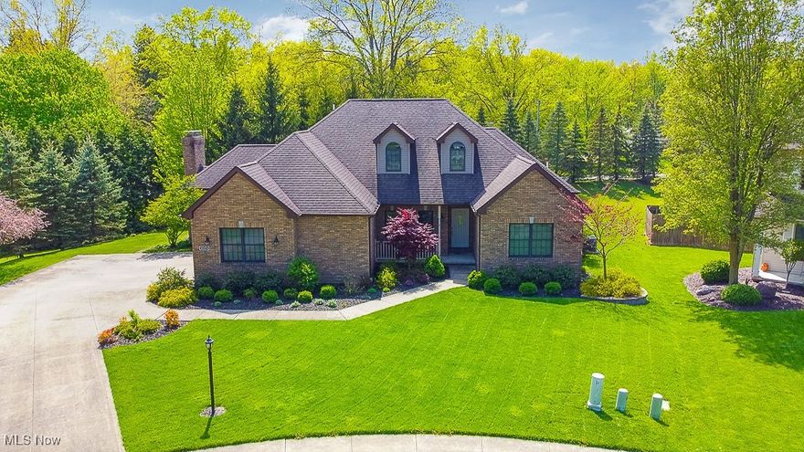 Welcome home to this beautiful, custom built Cape Cod on a quiet cul de sac, meticulously cared for by the original owners for over 20 years. This home features 4 bedrooms, 3 full and 2 half bathrooms, and an additional 720 sqft of finished recreation space in the basement. As you enter, you'll be welcomed by the gorgeous formal dining room and adjoined living room with fireplace. 
From there, you'll enter the fully equipped eat in kitchen with stainless steel appliances and a breakfast bar countertop. The attached family room provides a wonderful flow for entertaining as well as your second fireplace. A half bathroom close by for your convenience as well. Off the kitchen, you'll find the entrance to your cozy enclosed rear porch with an attached concrete patio for relaxing. The first floor boasts not only a spacious primary suite with a full bathroom including a shower and large bathtub, but two additional bedrooms, plenty of storage and another full bathroom. Don't miss the desirable first-floor laundry also!
The second floor offers the final large bedroom, spacious closets and another full bathroom. The huge, partially finished basement offers loads of additional living space, a large kitchenette, storage and another half bathroom. Pella windows and doors, beautiful landscaping and location are just some of the many attributes this gorgeous home offers. Enjoy the close proximity to the Metro Parks as well! Have your happily ever after here for years to come!