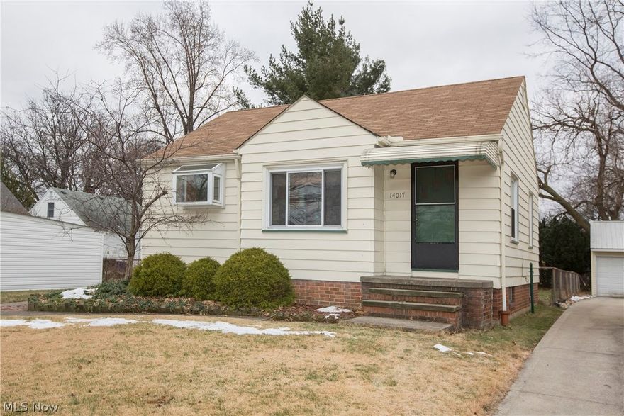 Prepare to be Moved!...into this tidy and well cared for Westpark ranch just minutes from I-90.  Hardwood floors and large picture window in living room.  Greenhouse window over the sink brightens the kitchen and appliances stay!  Two bedrooms and full bath complete the first level.  Downstairs, the rec room finished in classic knotty pine paneling features a built-in bar for all your entertaining needs.  Manageable yard with concrete patio and detached 1+ garage.  Convenient location, close to parks, shopping, transportation and minutes from downtown.  Great condo alternative!
