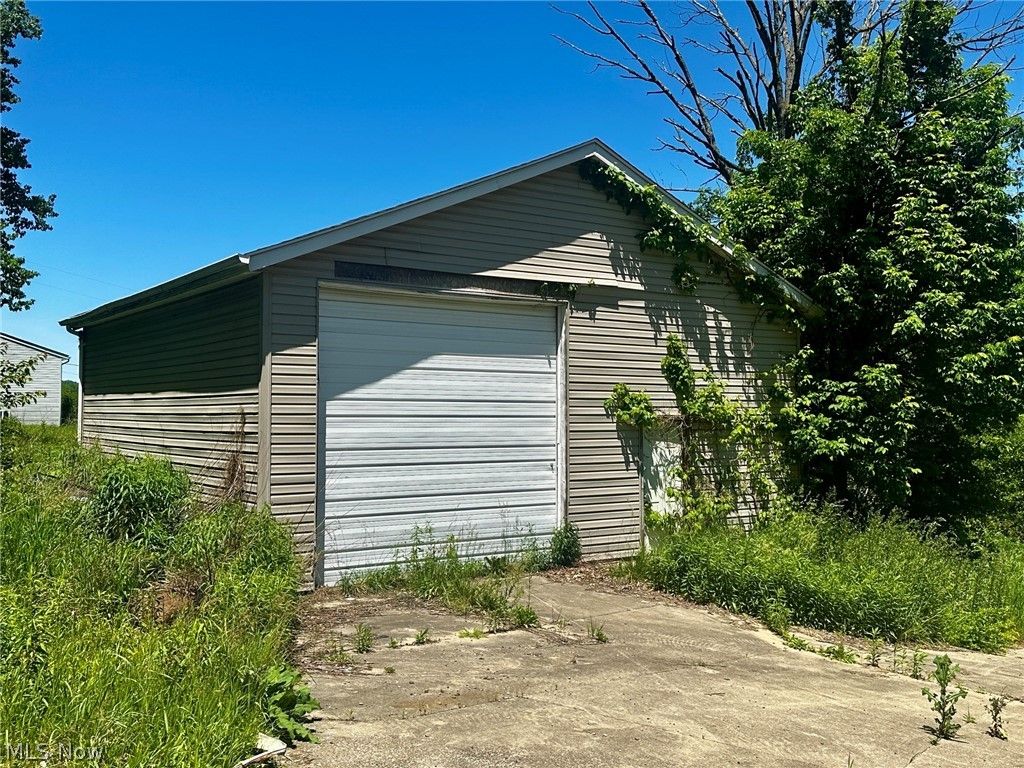 Photo of 1028 Arbor Road NE, Minerva, OH 44657 (MLS # 5214621)