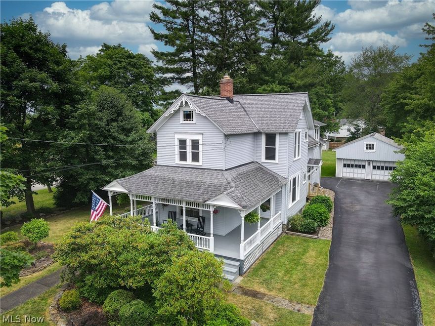 Welcome to this well maintained century home! Just beyond the manicured beds and flagstone, the wrap around front porch welcomes you. You'll feel the warmth and charm as you enter thru the vestibule into the living room. Lots of flex space here with 2 additional rooms that are perfect for tv/game time. High ceilings,beautiful millwork and loads of natural light thru out the first floor.Large eat in kitchen with granite and a separate bar area, perfect for entertaining. The formal dining room boasts amazing built ins, perfect for housing one's treasures.There is a 1st floor bedroom with a full bath that is currently being used as an office but also has it's own entrance.Upstairs you'll find a large owner's suite with a walk in closet and an en suite bath with granite, double vanity , walk in shower and a separate water closet. The remaining two bedrooms feature an adjoining room, perfect for a play/tv room. The basement has been waterproofed and offers plenty of storage. Step outside on