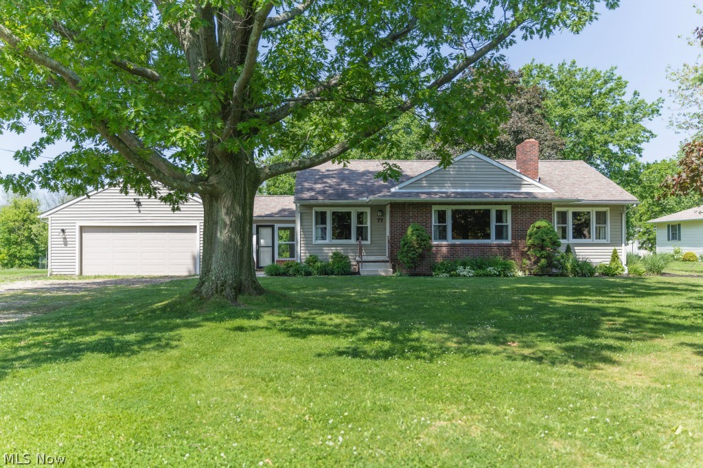 This spectacular 3-bedroom, 2-bathroom ranch features a newly finished basement area with a fireplace, hardwood floors throughout, an incredible backyard, newer windows and an attached 2-car garage. Wonderful wood cabinets in the kitchen with ceramic flooring. All of the bedrooms have hardwood floors and ample storage. The first floor is expansive with a breezeway to attach the garage and home. This is a 1.24-acre lot with plenty of space. Rest easily because the seller is providing a 1-year home warranty with the purchase. Call today for a private tour because this home will not last long on the market!