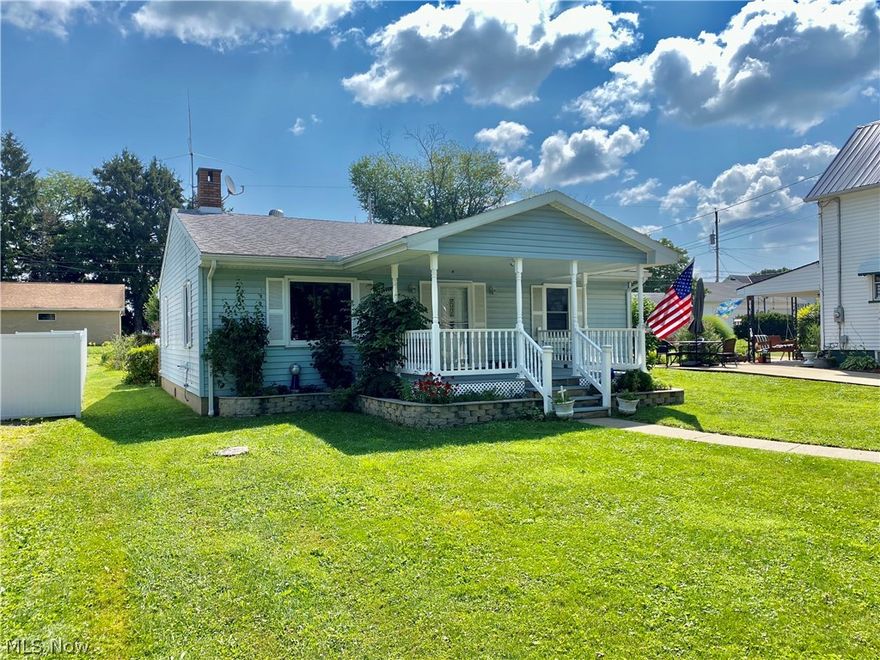 Solid 2 bedroom ranch ready for a new owner! Nice, convenient location close to Uhrichsville waterpark, Claymont's new stadium, gas stations, convenient stores, restaurants and SR250 and SR36 access. This home features a large living room with wood flooring and a brick fireplace, eat-it oak kitchen with breakfast bar, dining area, and French doors to a private deck/patio area. There are 2 bedrooms including the master which has an attached half bathroom. Full bathroom and laundry room round out the main level. New carpet and flooring in both bedrooms and baths and fresh paint throughout! Updated windows and new furnace and central air. There is also a huge 26'x24' attached garage with water hookup and access to the crawl space and attic for extra storage. If that isn't enough, don't worry, also on the property are 2 additional storage buildings. One is 12'x18' and the other 10'x16'. This home is in an estate and sells as-is. may require flood insurance. Schedule an appointment to see t