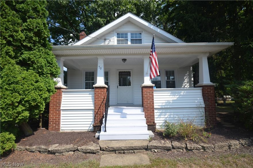 Incredible Portage Lakes opportunity!  This move in ready home Features 3 Bedrooms, 2 Full Baths, an Attached Garage and so much more.  The curb appeal from the street is excellent as you are greeted with a huge Front Porch.  Entering the home you come into the Family Room with a Fireplace.  Continuing though is a large Dining Room that opens into the Fully Applianced Kitchen.  On the other side of the 1st Floor are 2 Bedrooms and a Full Bath.  The upstairs of the house is extremely large for the 3rd Bedroom and another Full Bath - realistically the space could be broken down into a few rooms if needed for your lifestyle.  The exterior of the home has been well kept an has the perfect quaint backyard.  This is one you will want to see today for only $109,900.