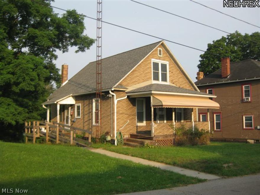 Home has many updates including roof, windows, furnace, central air, gutters & downspouts. Still needs TLC and cosmetic work. Possible downstairs bedroom. Convenient location near the park and downtown.