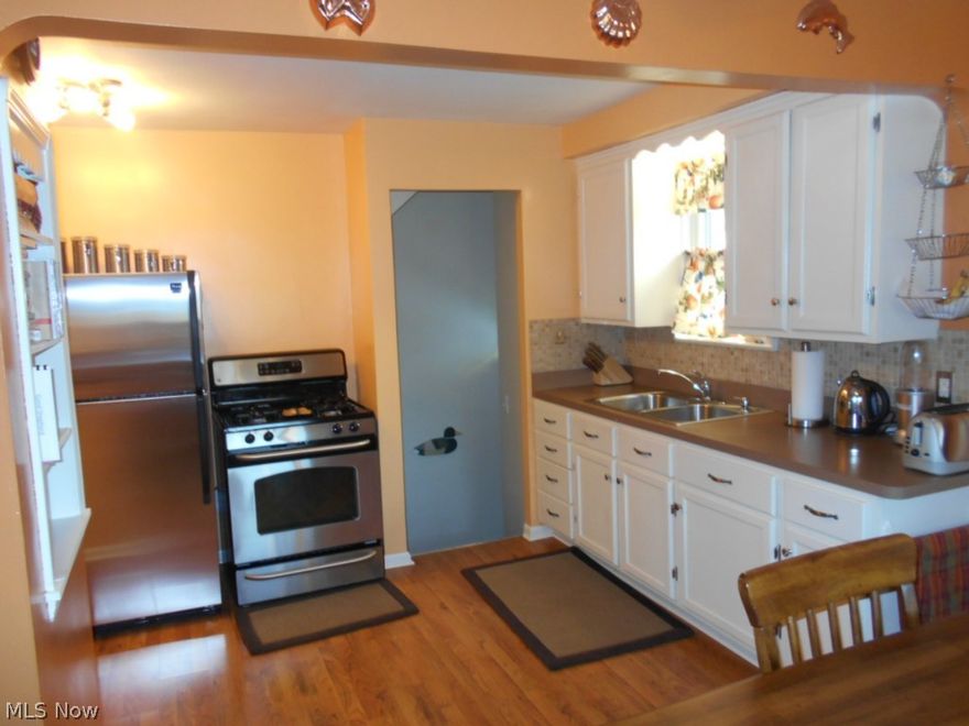 What a pleasant surprise when you walk into this home!  Home has many updates,  newer kitchen and bath, waterproofed basement in 2005 and new driveway, new furnace and central air in 2009, brand new 2 1/2 car garage in 2013, newer windows you don't need to worry leaf guard in 2014. House roof back replaced 1994 and front 2000 both with tear off.  Newly painted in today's colors, has great curb appeal and you're living worry free with everything that has been updated for you.  It's a must see home, you will love it.  Women will love the eat in kitchen and man you will fall in love with the 22x22 new garage.  Plus there's a newly build deck 12x16. All appliances stay including washer and dryer.  Minutes to I-480, airport and downtown.