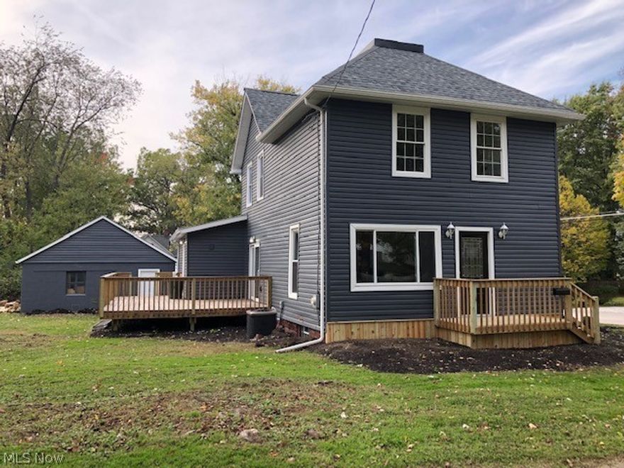 An Absolute Stunning Home!!  Completely revamped and has a floor plan to make newly build homes jealous.  This home is situated in the heart of Cuyahoga Falls within minutes from all the action including Front Street, Portage Crossing, Highways, Riverfront, Shops, Restuarants, Blossom Music and much much more.  Complete with a detached two and a half car garage with an all new concrete driveway this home was stripped to the studs and has all new insulation, drywall, electrical, plumbing, roofing with dimensional lifetime guaranteed shingles, brand new vinyl siding, water tank, air conditioning, 95% high efficiency furnace and a fully waterproofed basement.  Step into this 4 bedroom 2 bath open concept home complete with 3/4 thick maple hardwood flooring, recessed lighting throughout, a huge 1st floor master bedroom & bath, high end craft maid kitchen cabinets, granite countertops with generous countertop space, brand new stainless steel appliances, loads of natural light gleaning throu