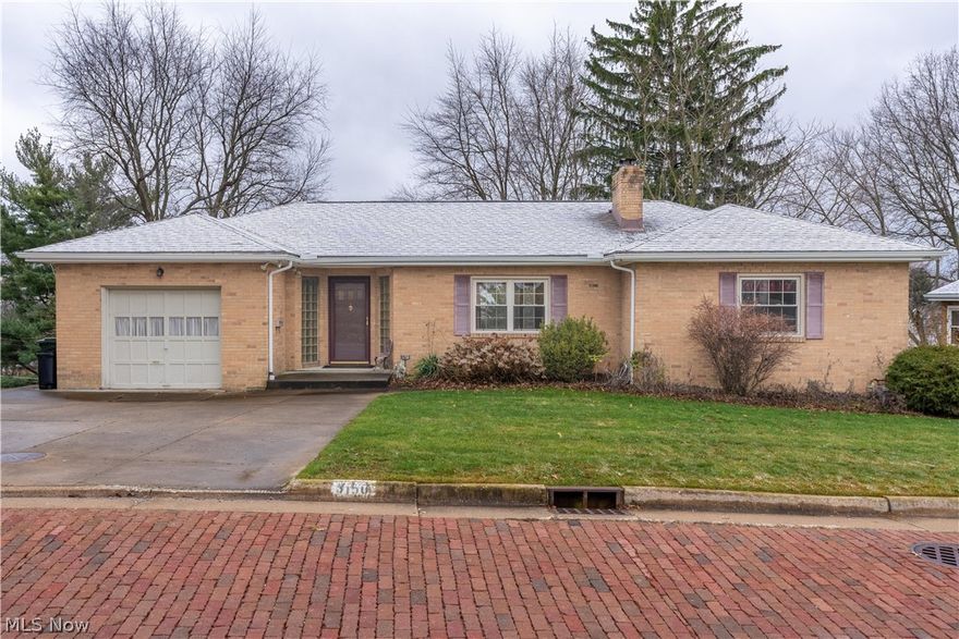 Spacious brick ranch on a quiet brick street and perched atop of one of the highest points in canton. Check out the great view from the floor to ceiling windows of the family room that features a wood burning stone fireplace. Deceptively large, this mid-century home has so much potential. Covered back porch steps down onto a stone patio. There is a large unfinished, 11- course basement that includes a wood burning fireplace with potential to be transformed into an additional living space. Be sure to check out this hidden gem in Plain Local Schools!