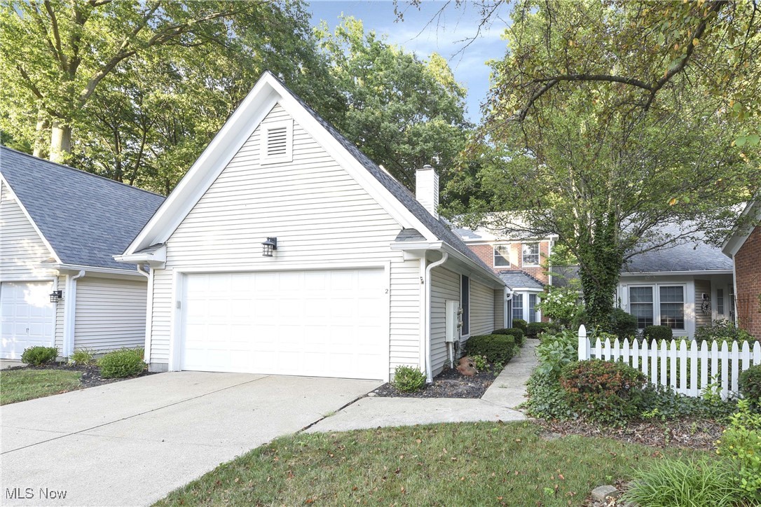 Prepare to be moved! Discover this thoughtfully updated townhome at 225 Westwind Drive, #2, Avon Lake, OH 44012, located in the sought-after Westwind community. The first floor has been freshly painted, offering a clean look the moment you walk in. Entering the home, you're greeted by the large formal dining room, a perfect space for hosting family gatherings. The kitchen boasts rich dark cabinetry, crisp white countertops, a modern backsplash, and all appliances included. The cozy breakfast nook offers an ideal spot to enjoy your morning coffee. Convenience is at the forefront with a designated laundry room that includes a utility sink, cabinetry, and a washer and dryer that remain with the home. Step into the expansive living room, where a striking white gas fireplace serves as the central focal point, beautifully highlighted by the warm tones of the hardwood flooring. On either side of the living room are additional bonus rooms—one enhanced by a skylight—each offering peaceful backyard views. These flexible spaces are ideal for a home office, entertainment area, or hobby room. Upstairs, the spacious primary bedroom features its own private full bathroom, a large walk-in closet, and an additional room that can be used for an office or a quiet retreat. A second generously sized bedroom also includes its own full bathroom, providing comfort and privacy for family or guests. Step outside to enjoy the serene backyard from the patio, lined by a wooded trees that adds both beauty and seclusion. Completing this wonderful property is a two-car attached garage for your convenience. The Westwind community enhances your lifestyle with amenities including a playground, pool, and tennis court. Ideally located near multiple parks, just a short distance from Lake Erie, and offering easy access to I-90, this home truly has it all. Don’t miss your chance to wake up every day in a place that feels like a getaway—right in the heart of Avon Lake.