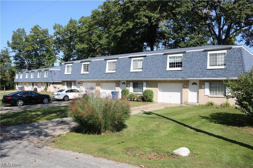 RARE find!! not one..but TWO brick triplexes for a total of 6 apartments! Each unit includes 3 BEDROOMS EACH (all good size..11x13, 11x12, 17x12) with 1.5 bathrooms and in unit laundry room (16x9), eat in kitchen (some with some appliances including dishwashers) (11x11), half bath, full bath, living room 16x11, freshly stained deck/balcony (12x8), walk out lower level, one car attached garage, all sitting on a 0.83 acre lot. Outside includes PLENTY of parking with concrete driveways, private wooded lot (right near a nature reserve), and just a few minutes to the water/main chain in Portage Lakes! Tenants pay for all utilities other than the outside lighting (about $96/month). Info above is for both buildings. Updates include new roof on both buildings (2021), several new air conditioners, 3 furnaces, all decks have been stripped and stained in the last 2 weeks, flooring, a few new hot water tanks, some new counter tops, faucets, toilets, and some paint. These 2 buildings are truly a goldmine!..great cashflow..with hard to find 3 bedroom, 1.5 bathroom units!. ***Info Includes both buildings***