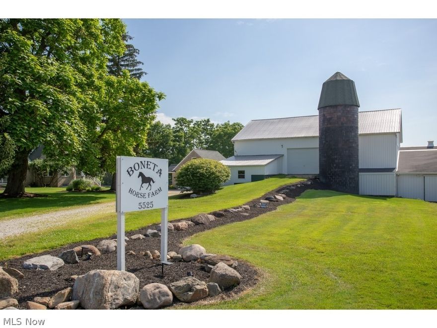 5 beds 3.5 baths 4,140 sq ft. HOME: Custom Victorian on picturesque 7.02 acres. Impressive 80 ft, wood stamped concrete wrap-around porch with wood rail/turned banisters. Spacious updated kitchen, vaulted ceiling, granite counters, large cooking island, walk-in pantry, custom hickory cabinets. Floor 1 Master suite, wood floor, large french doors with transom looking out to expansive back property nature view. 2 room master bath, large his/hers vanity area. Full tile, shower and jetted tub room. Horse facility: Indoor arena, 70X188 w/large doors to accommodate trucks/heavy equipment. Arena walkway into heated stable, 12 stalls, heated auto-water trays, tack and utility room, washer/dryer hook-ups. Large bank barn storage for hay/feed, tractor, other farm equipment. Out-building includes large 20X27 workshop and nice 557 sqft apartment originally built as caretaker quarters. Could be used for office. 7 pastures and 3 all weather paddocks with number 9 limestone, the larger paddock can be