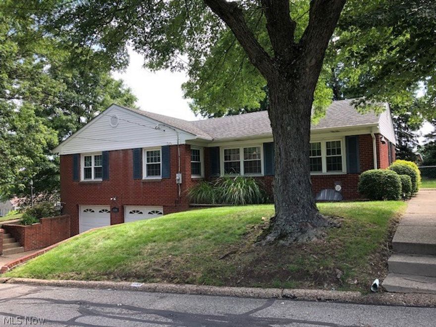 A LARGE HOME WITH A WHOLE LOT OF CHARACTER ..4 BEDROOM HOME OR 3 BEDROOM AND AN OFFICE, LARGE FORMAL LIVING ROOM OR COULD BE DINING ROOM WITH GAS FIREPLACE, FAMILY ROOM OFF OF DINING AREA COULD BE FORMAL LIVING ROOM. YOU CAN ARRANGE THIS HOME TO WHATEVER SUITS YOUR NEEDS.  BATHFITTERS HAVE REDONE THE SHOWER IN 1ST FLOOR BATH, OTHER BATHROOM HAS A GARDEN TUB, WINDOWS ARE NEWER, BACKYARD IS VERY PRIVATE, FENCED, AND PATIO WITH SUNSETTER AWNING. LARGE 2 CAR GARAGE, LARGE BASEMENT RECROOM HAS WOODBURNING FIREPLACE, OTHER ROOMS FOR STORAGE. WHOLE LOT OF CLOSETS ON FIRST FLOOR. CALL OFFICE TO VIEW.