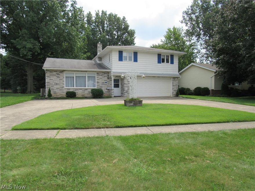 Be first or be sorry! Original owner! Customer built four bedroom, two and a half bathroom brick Split Level with a basement. Eat-in kitchen has ceramic flooring, breakfast bar peninsula, pantry, lazy susan and all appliances stay. Formal dining room and living room with volume ceilings. Family has half bathroom and a slider leading to a huge four season sun room with volume ceilings, big windows, air conditioning, stone fireplace, skylights and a slider leading to a patio and beautiful backyard overlooking acres of park like trees. Foyer with wall of mirrors. Basement has laundry room, canning shelves, mechanical area, space for recreation room and loads of storage. Two car attached garage has hot & cold water, drain and extra cabinets. Attic access thru closet. Nice circular driveway. Includes 1 year Cinch Home Warranty!