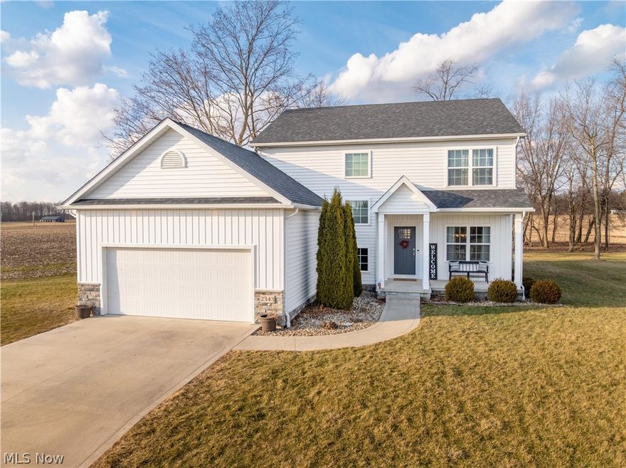 Well, HELLO ORRVILLE! This stunning custom-built two-story contemporary colonial, constructed in 2018, offers 2,328 square feet of modern, move-in-ready living space in the peaceful, sought-after Marsh Ridge community. Nestled on a generous 0.28-acre lot with beautiful privacy from the tree line, this 3-bedroom, 2.5-bath home perfectly blends country charm with contemporary convenience—just minutes from Orrville amenities yet feeling worlds away. The two-car attached garage and smooth concrete driveway add effortless functionality. At twilight, the warm glow from every window creates an inviting, magazine-worthy welcome home. Inside, light-filled and thoughtfully designed: An open-concept main level flows seamlessly from the spacious living area into an eat-in kitchen featuring stainless steel appliances, granite countertops, and plenty of cabinetry, and pantry included! The living room offers a beautifully constructed built-in offers a warm, and inviting fireplace, perfect for the chilly days when you just want to grab a book or enjoy the views. First-floor laundry makes everyday life easier. Upstairs you’ll find three generously sized bedrooms, a versatile loft/family room area, and well-appointed bathrooms (including a convenient half-bath on the main level).
Additional highlights:
•  Unfinished basement ready for your personal touch (extra storage or future expansion) The high ceilings are a definite win for this basement!
•  Impressive 34 × 16 deck with pergola—perfect for entertaining, grilling, or relaxing under the stars, and even watching the sunsets
•  Energy-efficient features throughout this 2018 build
Whether you’re looking for your forever home or an incredible investment, 2343 Pebble Brook Path delivers comfort, style, and low-maintenance living in one of Orrville’s most desirable neighborhoods Ready to make it yours? Schedule your private tour today!