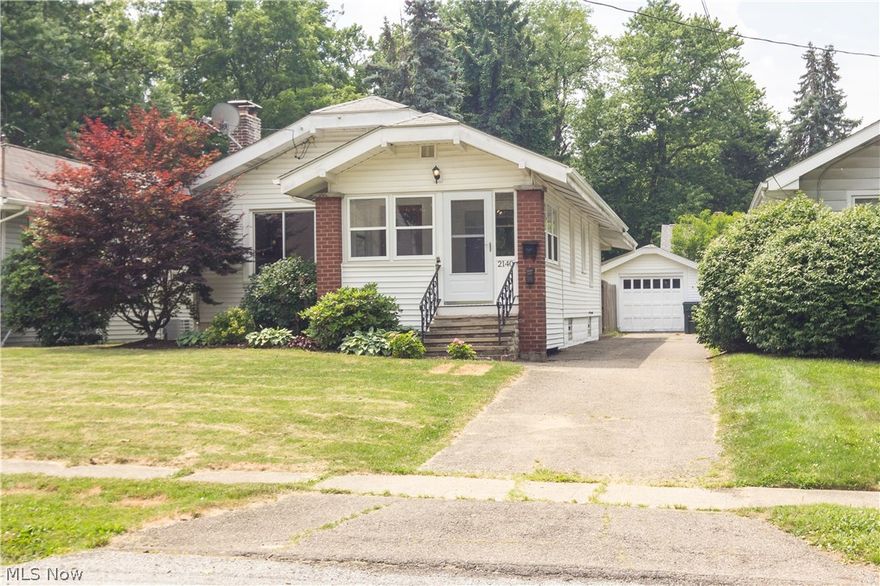 This charming, move-in ready 1920’s ranch is conveniently located on a quiet street, within an easy walk to all that Front St. has to offer.  As you enter the enclosed front porch, the vintage leaded glass front door welcomes you, and once inside you will notice many original features - natural woodwork, doors, hardware, and a bathroom with original tile and built-ins.  A spacious front room, with the original fireplace, accommodates a living area and a dining area, and opens to the kitchen. The well maintained back deck opens up to a fully fenced yard, which is perfect for children and/or pets. There is new carpet throughout (2017/2018), new gutters (2018), and a new Hot Water tank (2016). The fireplace has gas logs that have never been used or connected to the gas line. The lower level has a partially finished living space, ample storage and a laundry area.  Home Warranty included.  THIS PROPERTY IS NOT A RENTAL.  DISREGARD ANY ONLINE ADS INDICATING SUCH.  ANY QUESTIONS PLEASE CALL T