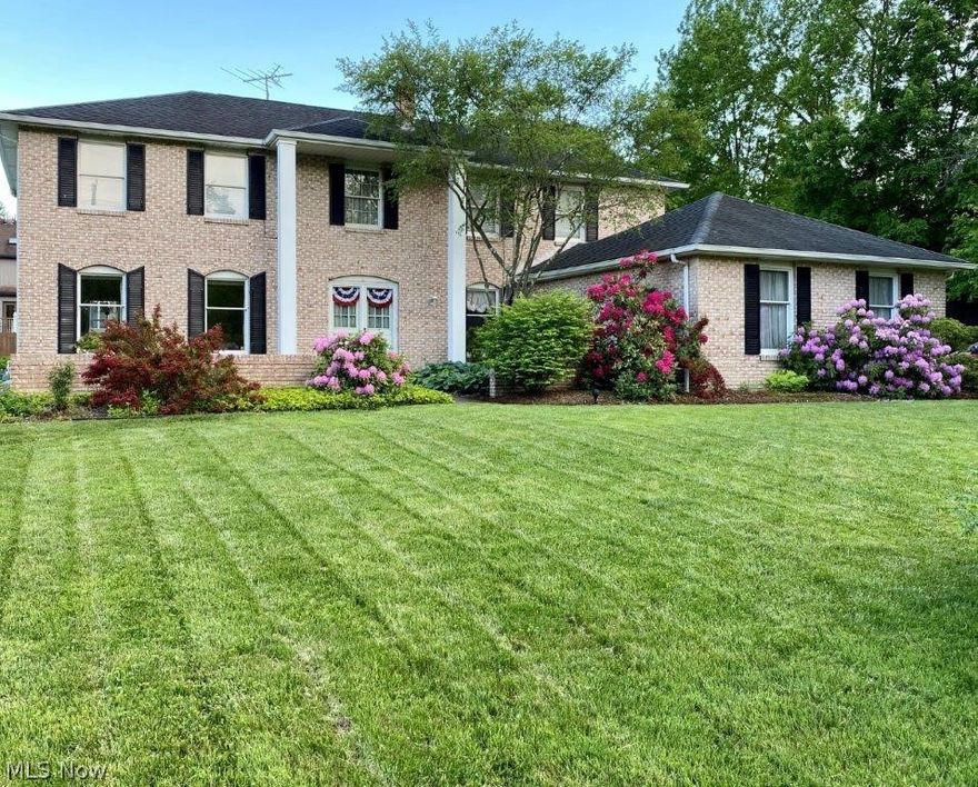 Lovely center hall colonial was a former model for the Highlands of Brecksville. This home has a two story foyer abutted to the right by the den/office with wood flooring and to the left by the spacious living and dining rooms, also with wood floors. All appliances will remain in the large, eat-in kitchen, which looks into the vaulted family room with updated moldings and a direct vent gas fireplace. There are French doors that take you into a sun room overlooking the patio and a beautiful yard with a privacy fence in the back. You"ll enjoy the included natural gas grill with two convenient outdoor hook-ups: one next to the patio and one outside the garage service door. The second floor offers an enormous, vaulted master bedroom with a wall of closets and a master bath with a skylight and a commode closet with window. There are three additional bedrooms and a guest bath. The lower level is finished with Owens Corning walls and newer carpet that has vapor barriers underneath. The furnac