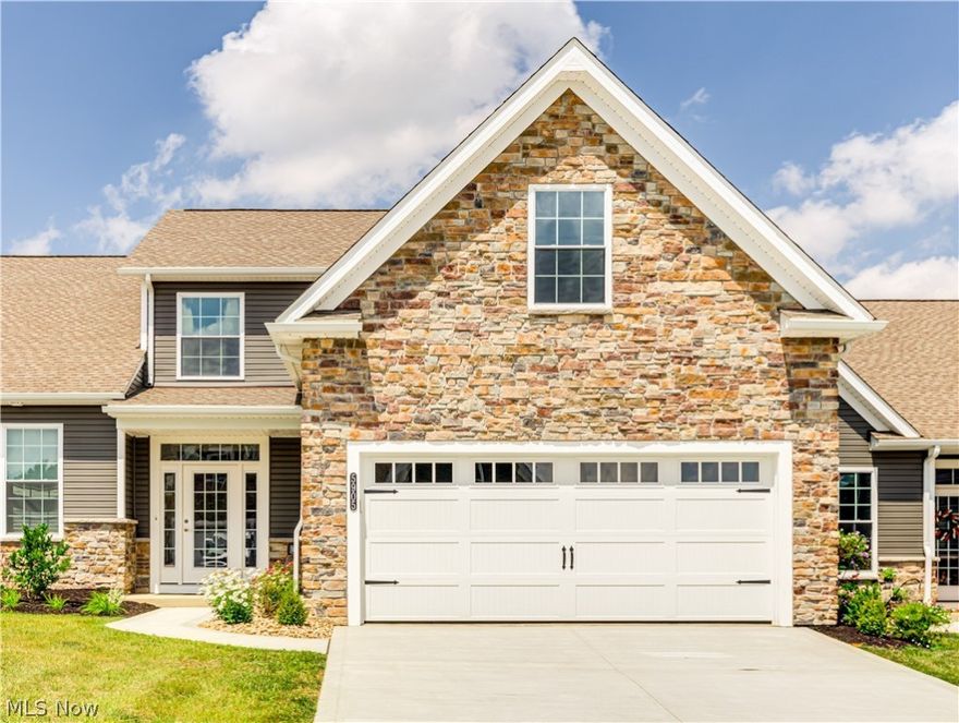 WALK-OUT BASEMENT NOW AVAILABLE! This center unit 2 story was built with a full walk out basement and features an upper deck as well as lower-level patio. The views from this unit give an added sense of privacy. The largest of the floor plans, it provides 2212 sq ft of finished living space. The main level features an open concept Kitchen with a 9' island that provides space for bar seating, separate dining room & great room with upgraded beamed ceiling and fireplace. Quartz countertops throughout. The luxurious Owner Suite has an ensuite bath with the popular walk-through closet that opens into the Laundry Room. The first floor also has a private guest half bath. The 2nd Floor Living Space creates the feeling of a private retreat. It includes a loft area that can serve as a sitting room or work at home space, two bedrooms & full bath. The second floor also has an extra walk-in closet and a linen closet for maximum storage. The walk out basement has 8 ft ceilings, poured concrete and plumbing roughed in for future finishing. There is a sliding door out to the patio along with a large window to let in plenty of natural light.