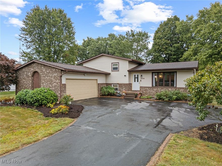 Come take look at this Beautifully updated tri-level. Tastefully decorated. Spacious kitchen with new hickory cabinets, granite countertop, and tile back splash, with Stainless appliances. Both bathes have been nicely updated with ceramic. The luxury upper bath has tiled shower, heated flooring, a dbl vanity. The windows have been updated. A new Water softner and water filter have been added in the past year. There is a bonus room on the first lower level, could be a office.  Lower level of this Tri-level has potential for extra  living  space. Nicely landscaped with fresh mulch. There is a screened porch off of the dinning area which leads to a deck to the private back yard. Seller is offering a 1 yr home warranty thru CHOICE HOME WARRANTY. EXCLUDE the 2 electric fireplaces. This house is turn key all the expense of remodeling has been done very nicely, so don't miss out on this one.