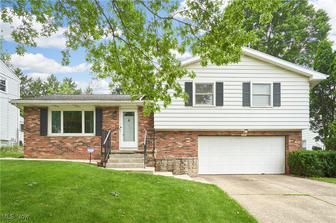 Move-In Ready in the Heart of Fairlawn!
This spacious 3-bedroom, 2-bath home offers comfort, style, and an unbeatable location. The beautifully updated kitchen features granite countertops and stainless steel appliances, opening to a generous-sized family room with a cozy wood-burning fireplace and custom built-ins. The first floor also includes a living room and dining area, all enhanced by stylish and durable LTV flooring throughout. And you will love the massive California closet tucked behind the family room that's great for storing extra kitchen items, toys, decorations, etc.
Start your day in the inviting three-seasons room or entertain guests on the gorgeous cedar deck overlooking the private backyard. The finished lower level provides a large rec room plus two additional finished rooms — ideal for a home office, gym, guest space, or playroom. There's also a large unfinished room that's great for storage.
Additional features include an attached oversized two-car garage, updated bathrooms, and access to the ultra-fast Fairlawn Gig internet. You’ll also appreciate free trash disposal through the Fairlawn Compactor.
Located just minutes from Herberich Elementary, the newly renovated Croghan Park, Sand Run Metro Park, Summit Mall, and a variety of shops and restaurants — with quick access to I-77 — this home combines convenience and lifestyle in one exceptional package. Move right in and enjoy!