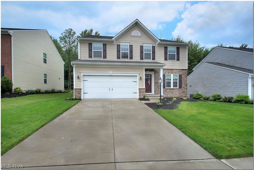 A place to call home in Liberty Ledges - a family friendly neighborhood in Twinsburg. Open floor plan throughout this 2-year-old home. Kitchen includes a gourmet island, 42" maple cabinetry, stainless steel appliances, and recessed lighting. The first floor is complete with a formal dining room and a private office with French doors. Spacious bedrooms upstairs with generously sized closets. Entertainment/Bonus room upstairs makes for a great sitting or craft area. 2nd-floor laundry room. Ensuite master bedroom with bathroom featuring double vanities, shower. The wonderful backyard is against the wooded area that will never be built on. Excellent rated Twinsburg Schools. The city of Twinsburg has an abundance of amenities including a community center, fitness center, indoor/outdoor pool, biking/hiking trails, dog park, and lots of restaurants, medical facilities, and grocery/shopping centers. Ideal location, just minutes from 271/480 making a commute to Cleveland and Akron in under 30 m