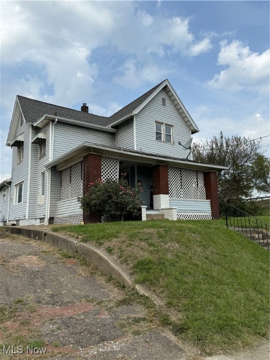 4-bedroom, 1-bath home with plenty of space inside and out! The main level features 3 spacious bedrooms, a large dining area, and a well-appointed kitchen. Enclosed porch overlooking the expansive, fenced yard. This property also includes two extra lots, one of which has a 1-car garage. For added convenience, there's a handicap-accessible ramp at the back door. Perfect for those looking for extra space and outdoor possibilities!"