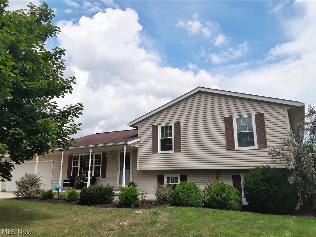 If you're looking for tranquil country living in a relaxing, park-like setting then your search is over! This is a "must see" impeccably maintained 4 level split with 3 bedrooms & 3 full baths on beautifully landscaped 3.28 acres. The covered front porch welcomes visitors as they come down the paved drive with turn-around for extra parking. City water was installed & the well was sealed in 2018. Kitchen has breakfast bar & opens up to Dining room. All Kitchen appliances stay, many being replaced in past 3 yrs. with counters & back-splash done in 2014. Spacious Family room is just a few steps down from main level, where there's also a laundry room & full bath. Pool Table will stay in basement. The master bedroom has it's own private full bath and the other 2 bedrooms share another full bath. The 32 X 24 Outbuilding has electric and would be great for car buffs, wood workers, or a multitude of hobbies or interests! There is a 24 X 10 screened room off the back of outbuilding where you can relax to read a book, or gather with family & friends. You won't be bored with so much to do here, swimming, bonfires, or just enjoying the open space! Don't miss out on the wonderful property, it won't last long!