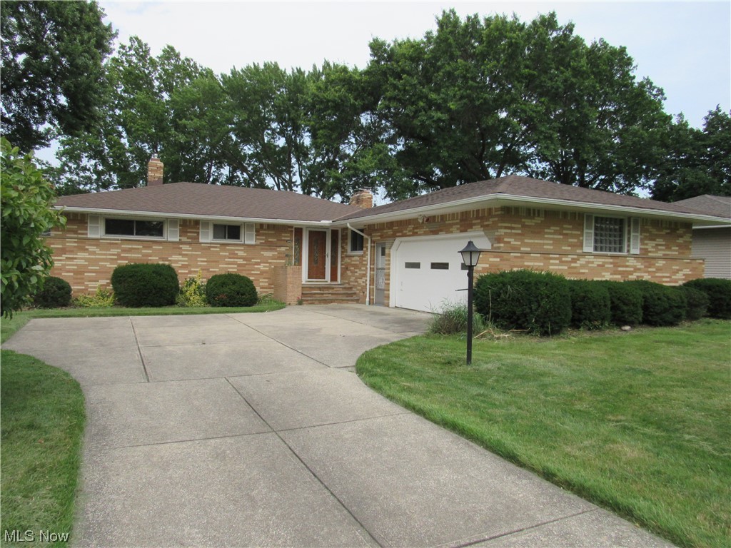 Be first or be sorry! 3 bedroom 3 full bath brick ranch with a side load garage on a quiet street! Immediate Possession! Vinyl windows! Freshly painted with neutral colors! Eat-in kitchen boasts stainless steel appliances! Ceramic tile flooring! Granite countertops! Pantry with pull out shelves! Formal Dining Room! Open & airy living room with stone fireplace! Large 3 panel sliding glass door leading to the 3 season Sun Room with newer floor and ceiling tiles! Family room could make nice home office! Beautiful hardwood floors in living room, hallway & bedrooms. Updated main bath and owner suite bath! 2 car attached garage has Lift Master opener, drain, hot/cold water, glass block windows, utility sink, & pull down stairs to attic! Large basement has recreation room with a fireplace! Bonus Room with full bath could be a fourth bedroom! Bedroom window converted to egress/ingress window! Work shop & laundry room in basement! Roof 2019! Gutters & downspouts 2021! Windows 2019! Granite coun