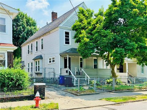 Single Family Residence in Cleveland OH 6412 Carl Avenue.jpg