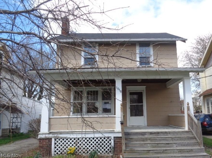 Large Three Bedroom Colonial minutes away from Lake in Lorain Ohio. The interior features large living room with brick fireplace, large formal dining room with built ins & windows seat, hardwood floors throughout the first floor, and lead glass windows. Full unfinished basement, large covered front porch, deck in the rear and second floor porch. Private wood fence and a detached two car garage. Needs a little TLC! Great opportunity to own your own home at an Exceptional Value. Don't miss out, Call Us Today for more information / details and a Private Tour of this Great Colonial. This property is owned by HUD and is being sold in as-is condition. HUD will not make any repairs. HUD Case # 412-507554. This property is managed by Matt Martin Real Estate Management.
