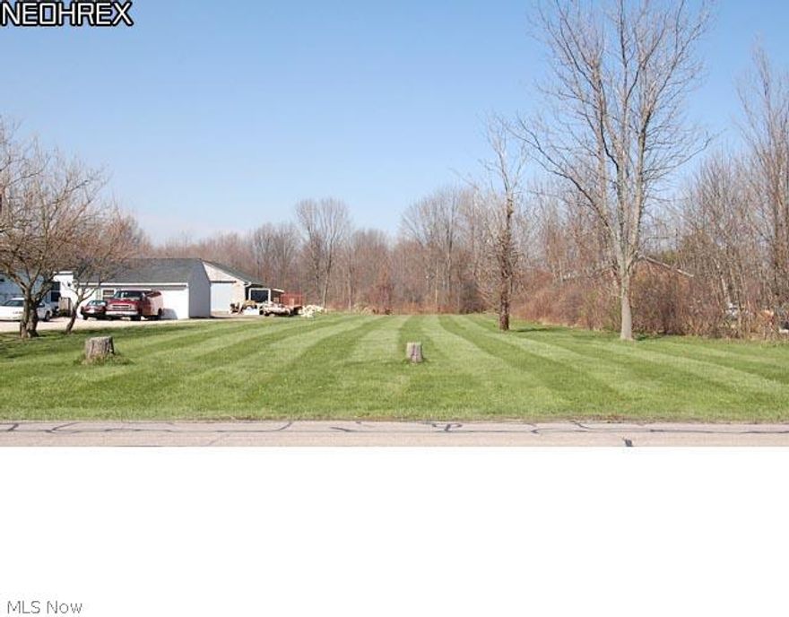Build your dream home on this 1.98-acre vacant lot on the Columbia Township/Strongsville border. The most convenient location in Columbia Township? Gas, water and electric available at street. Sanitary sewer line installed on street October 2009 ** Realist PDF Flood map says this property is in 'Zone X - An area that is determined to be outside the 100- and 500-year floodplains.' The map is also colored to indicate that this property, and adjoining properties, are 'Out of Special Flood Hazard Area.' ** At the intersection of Marks Road & Country Meadows. Google-map 'Marks & Country Meadows 44028'