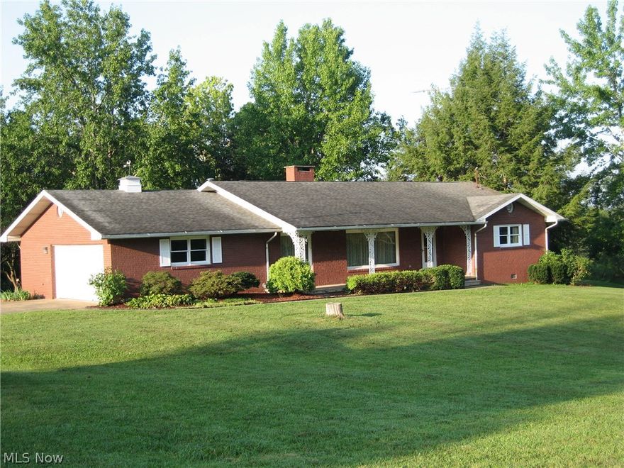 Wonderful move in ready brick ranch on over 2 acres with pond stocked with bass and blue gill. Private back yard setting offers grape arbor, garden area, and mature landscaping. Kitchen offers an abundance of cabinet space, with wrap around counter, and desk area. 30x11 sun room, 20x7 laundry and utility room, spacious living room, family room that opens to sun room.  Master bedroom with update bathroom, and new carpet. And two additional bedrooms.  New hot water heater, new garage door opener.  Remodeled bathrooms.  Newer roof and HVAC.