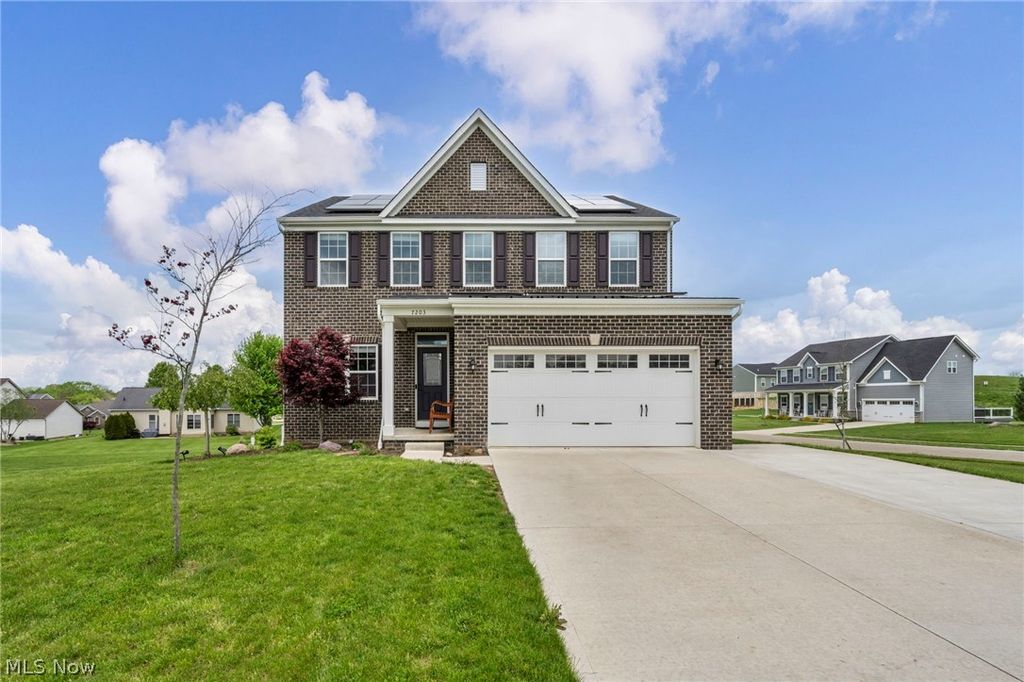 Photo of 7203 Stonegate Circle NE, Canton, OH 44721 (MLS # 5208346)